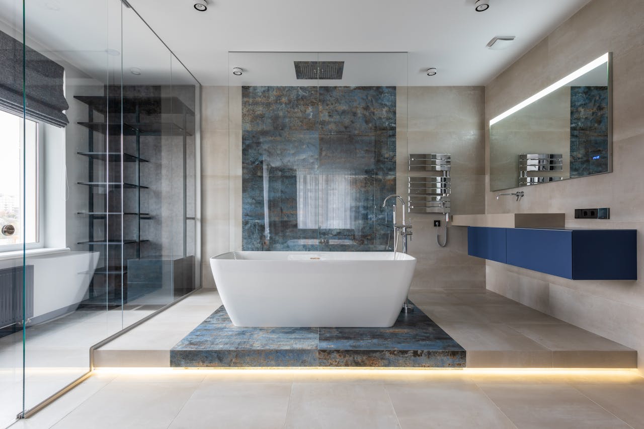 gallery-02 Elegant bathroom featuring a ceramic freestanding tub and contemporary design elements.